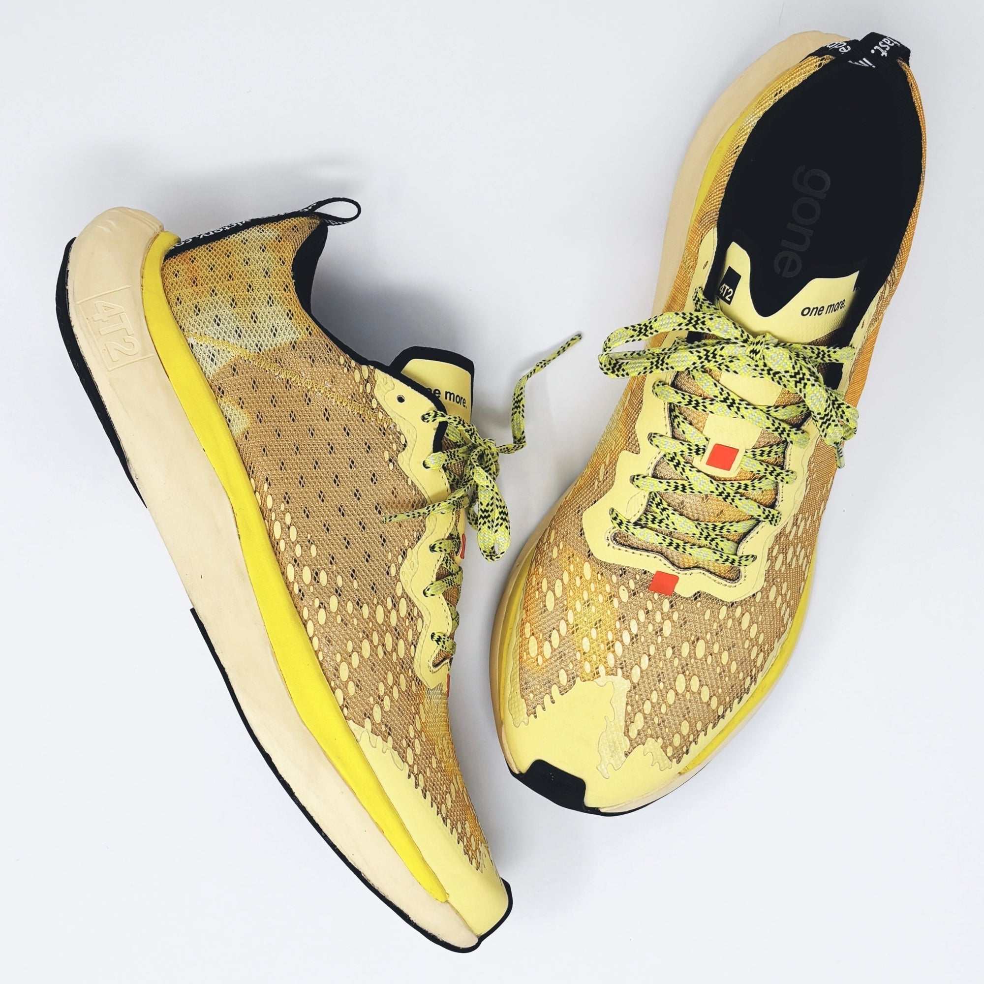 Yellow personality running shoes with breathable upper and grippy rubber outsole.