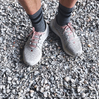 Comfortable sundays shoes on rocky surface, designed for long, relaxed runs.
