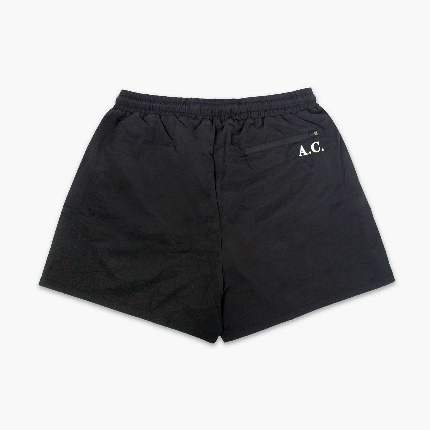 Black 5" running shorts with back and side pockets, featuring durable YKK zippers, made from recycled polyester.
