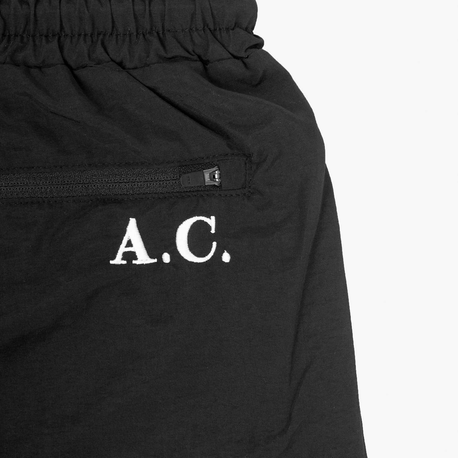 LPU 5" Running Shorts - Black with back pocket and zip closure.