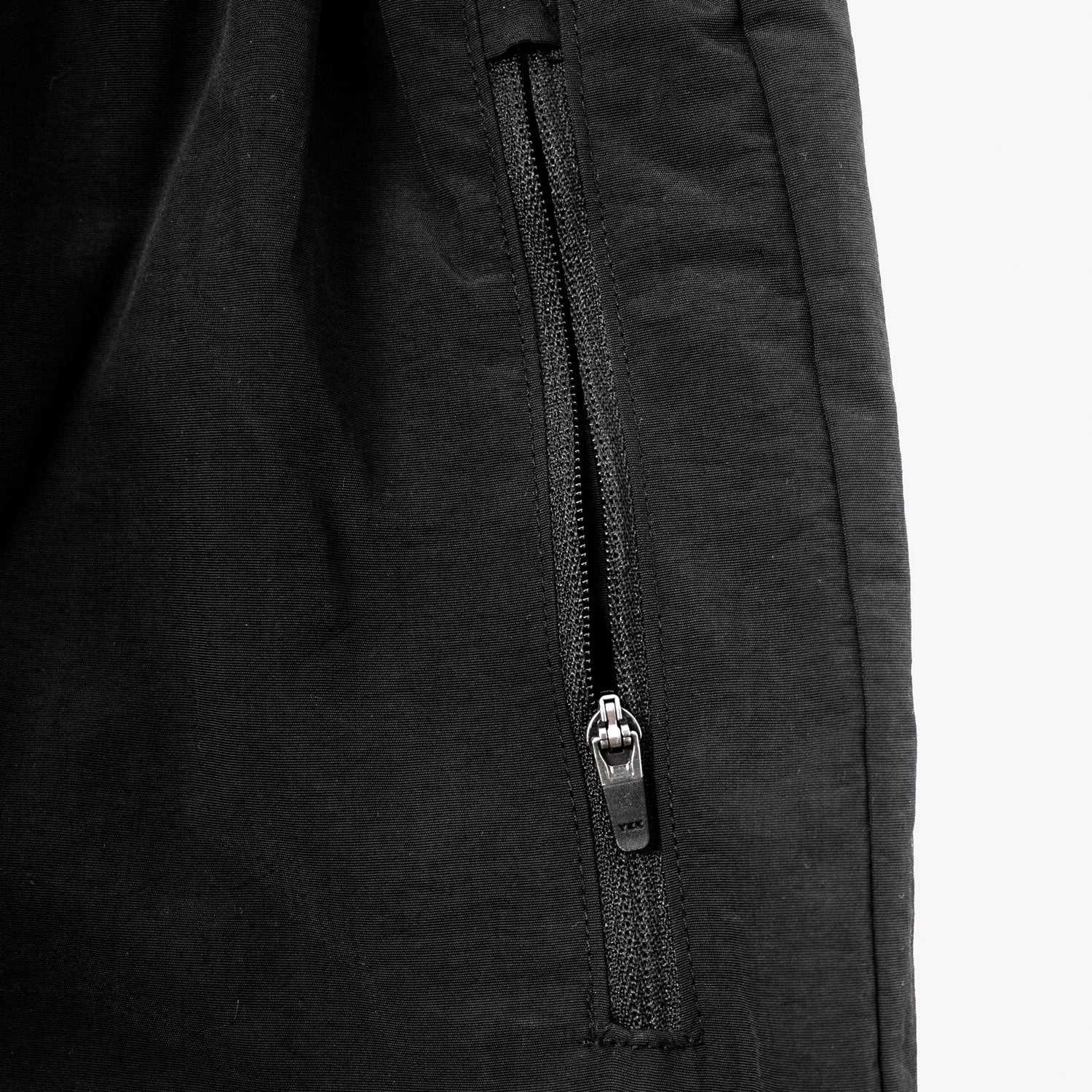 LPU 5" Running Shorts - Black with durable YKK zipper on side pocket, made from high-quality recycled polyester.