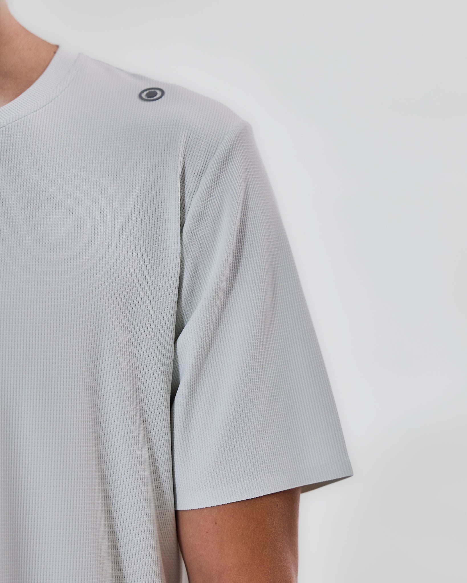 Off white H.Koumori Training T-Shirt with breathable fabric.