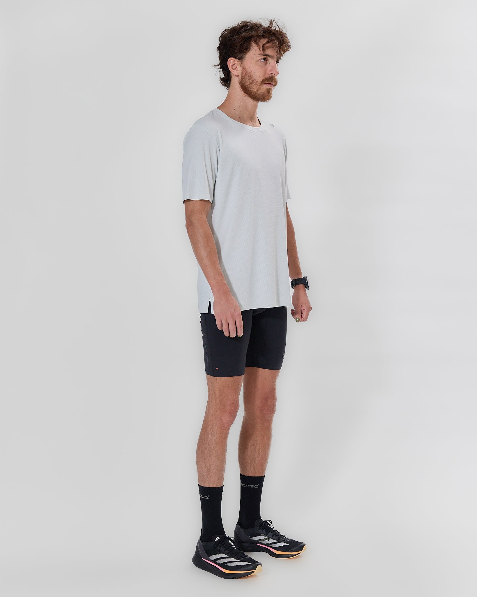Off white H.Koumori training T-shirt for running, featuring light, breathable fabric and 4-way stretch for comfort and performance.