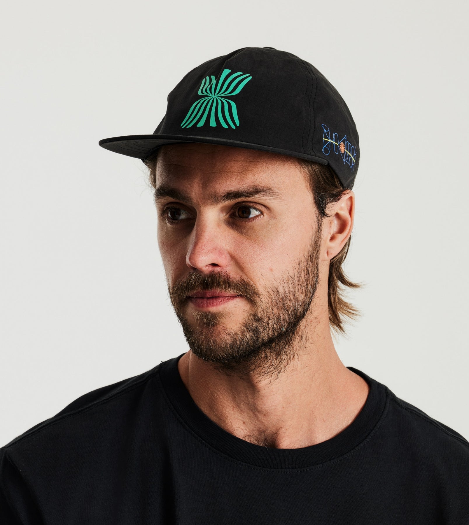 Run Amok Running Cap with low-profile fit and printed reflective logos.