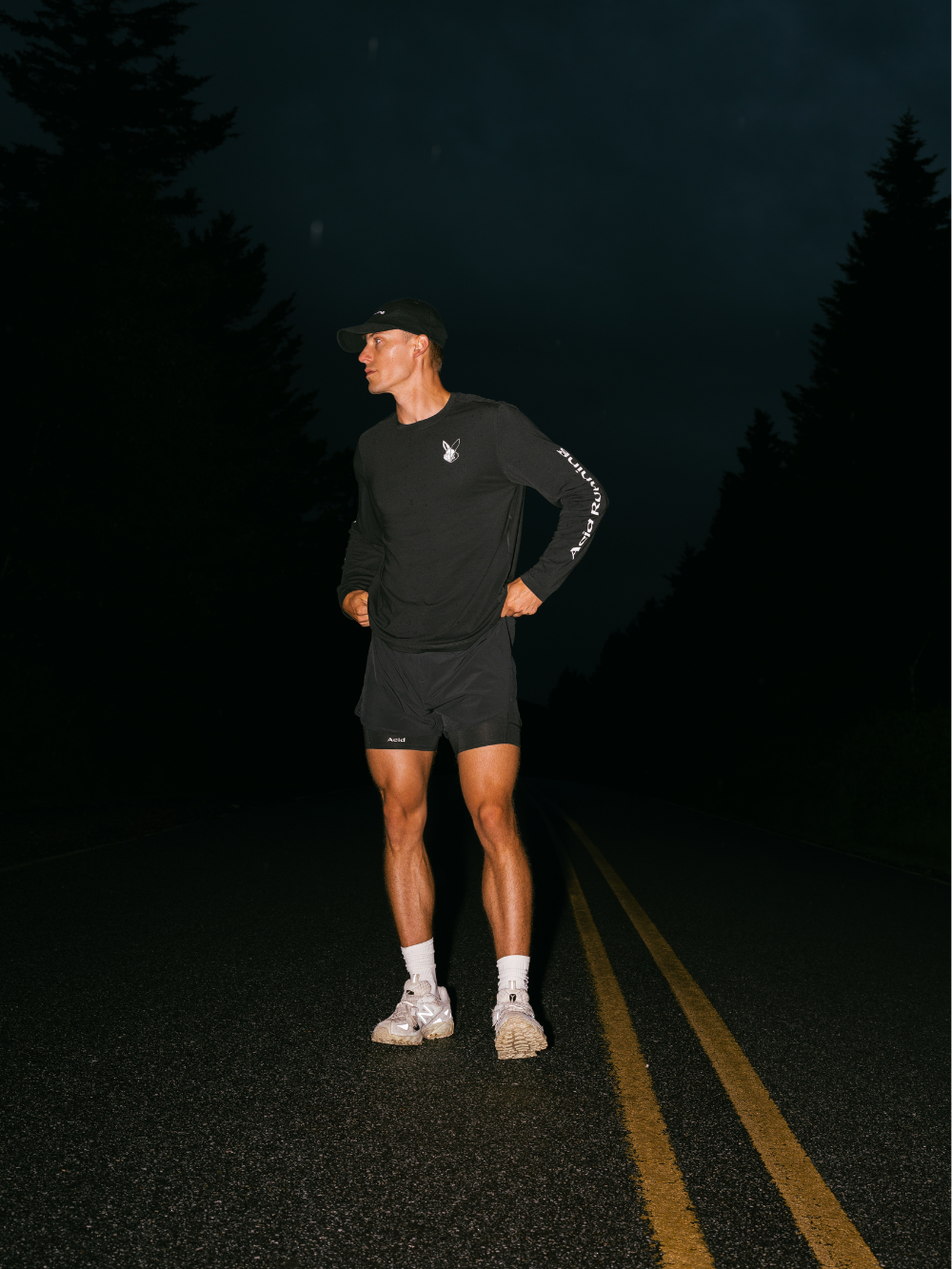 Long sleeve t-shirt in black with white prints, featuring a relaxed silhouette, advanced fabrics, and sustainability-conscious design.