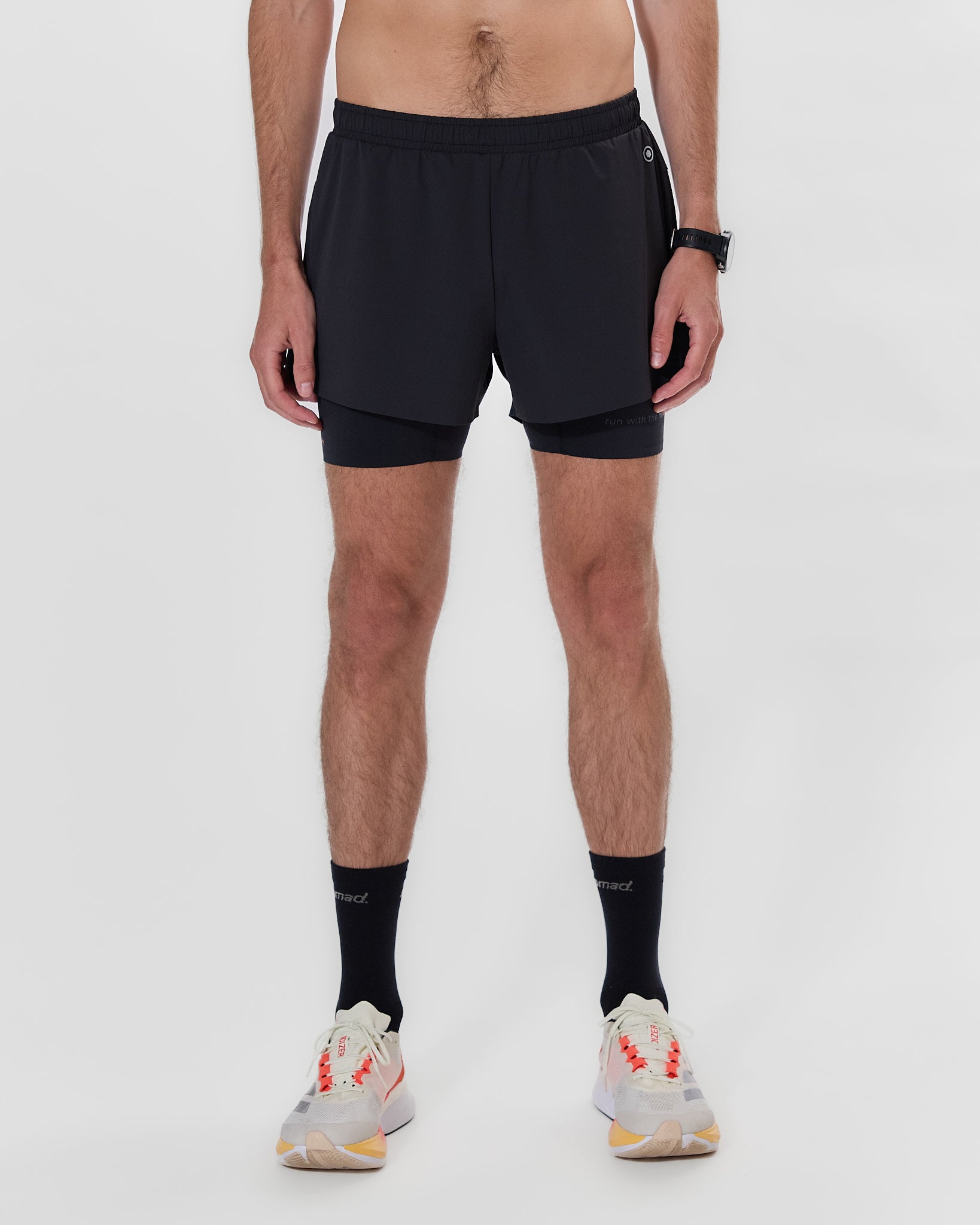 Koumori Training Shorts with compression tights and zippered pocket.