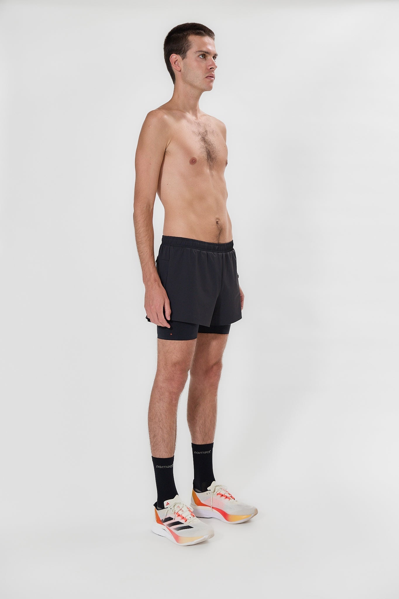 Koumori Training Shorts with inner compression tights, adjustable waistband, and pockets.