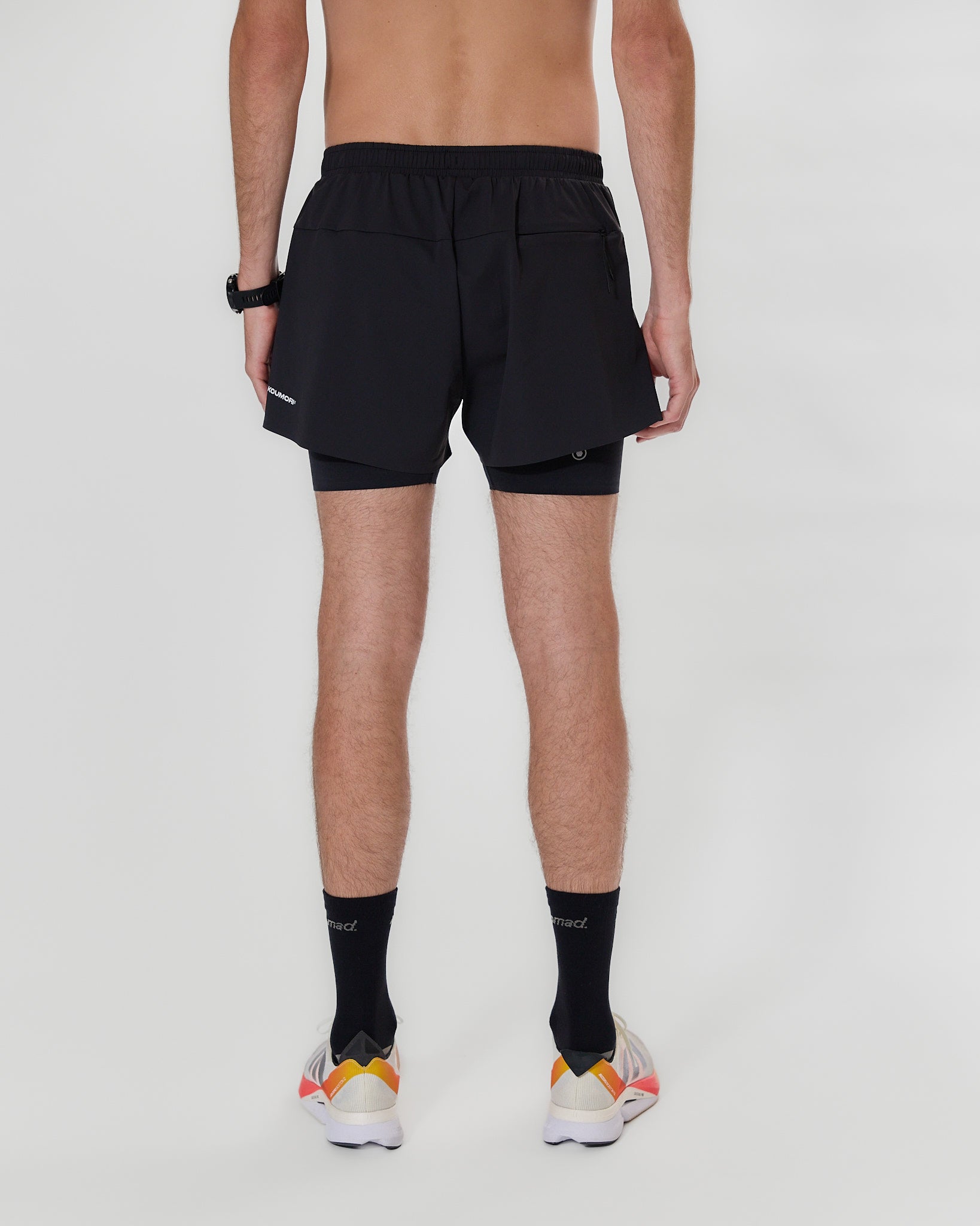 Koumori Training Shorts with inner compression tights and adjustable waistband, back view.