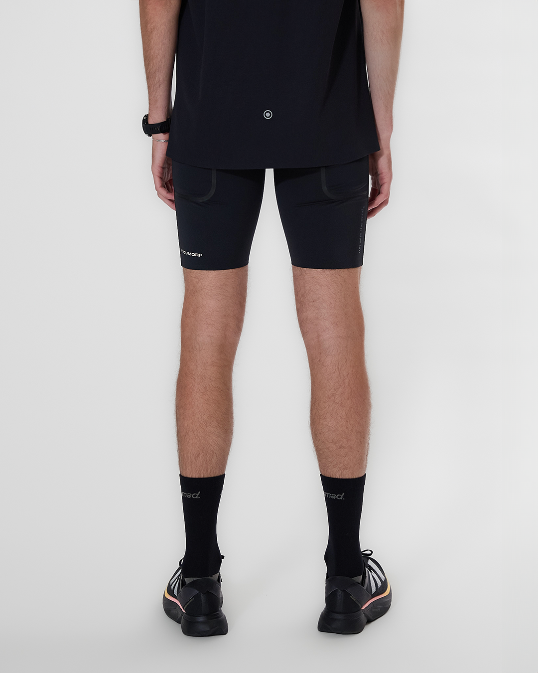 H. Koumori Training Tights, breathable running half tights with multi-pocket system and reflective details.