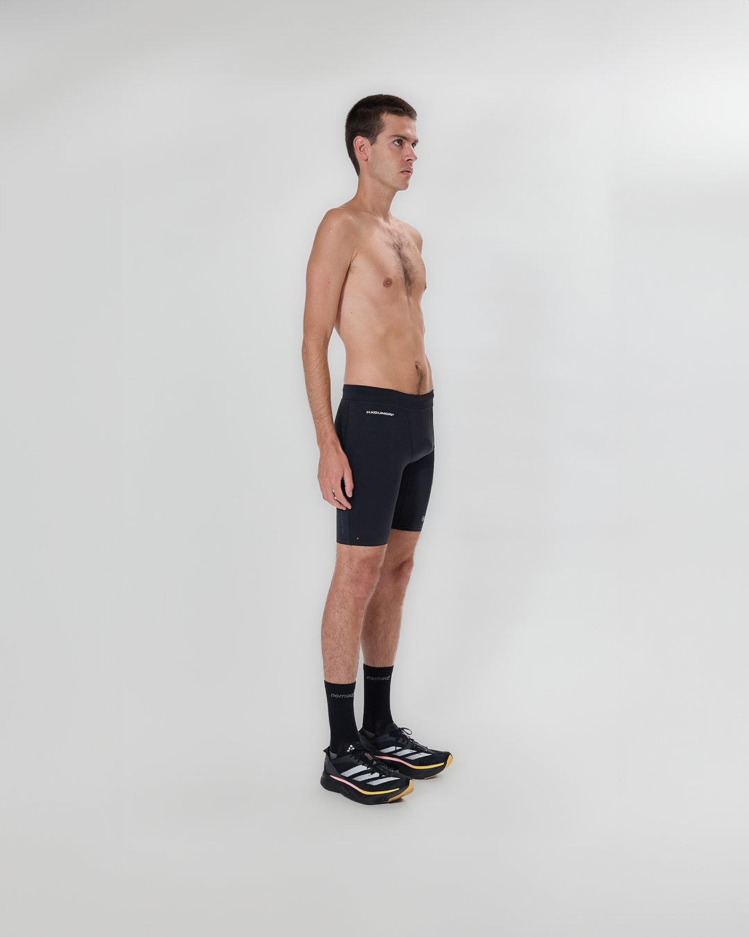 Koumori Training Tights showcasing multi-pocket design and breathable fabric.