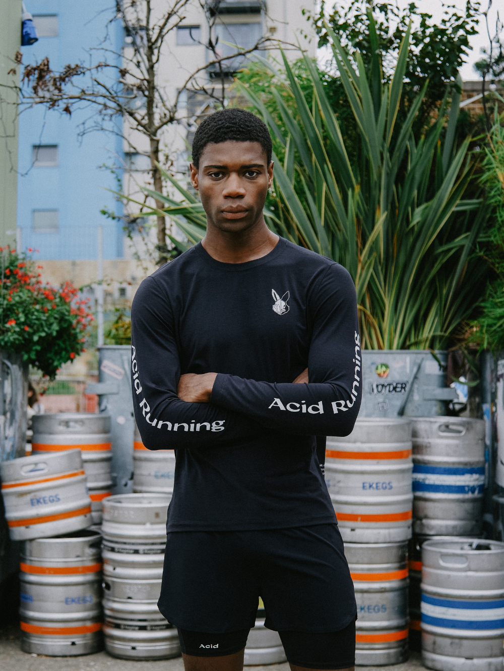 Long sleeve black t-shirt with white prints, featuring advanced, sustainable fabrics.