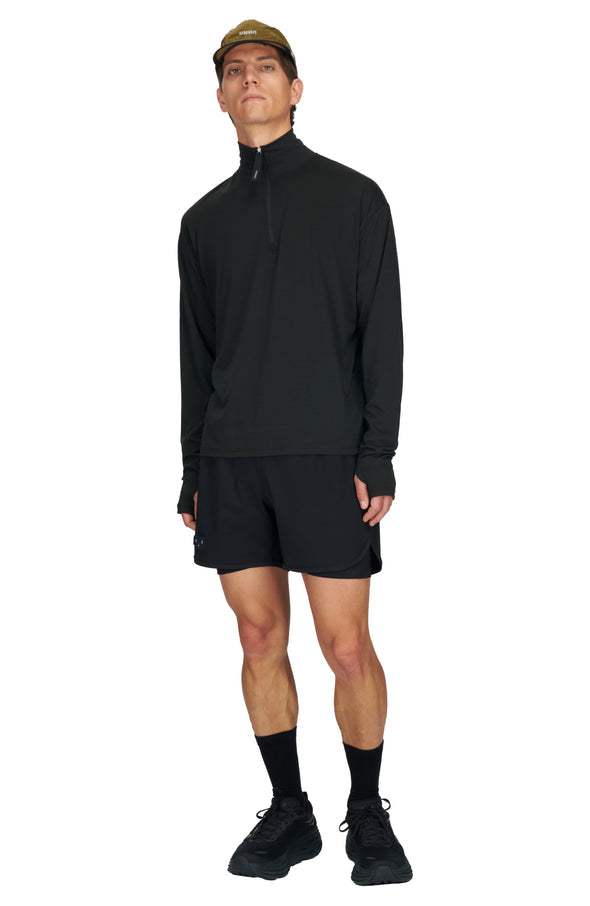 Men's long sleeve black wool running layer with half-zip and high collar.
