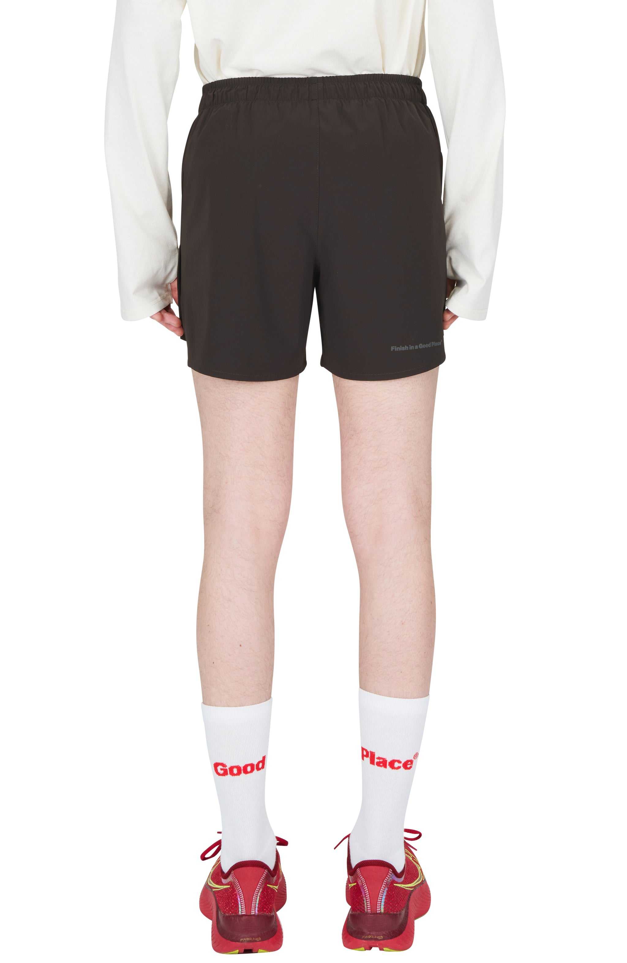 Men's Java Brown running shorts with side vents and hidden pockets.