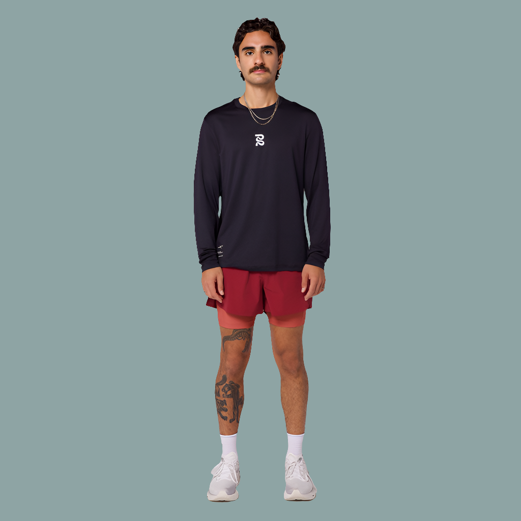Men's Vento™ 4" 2-in-1 Short in Cherry/Spice worn by model with black top, showcasing performance and comfort.