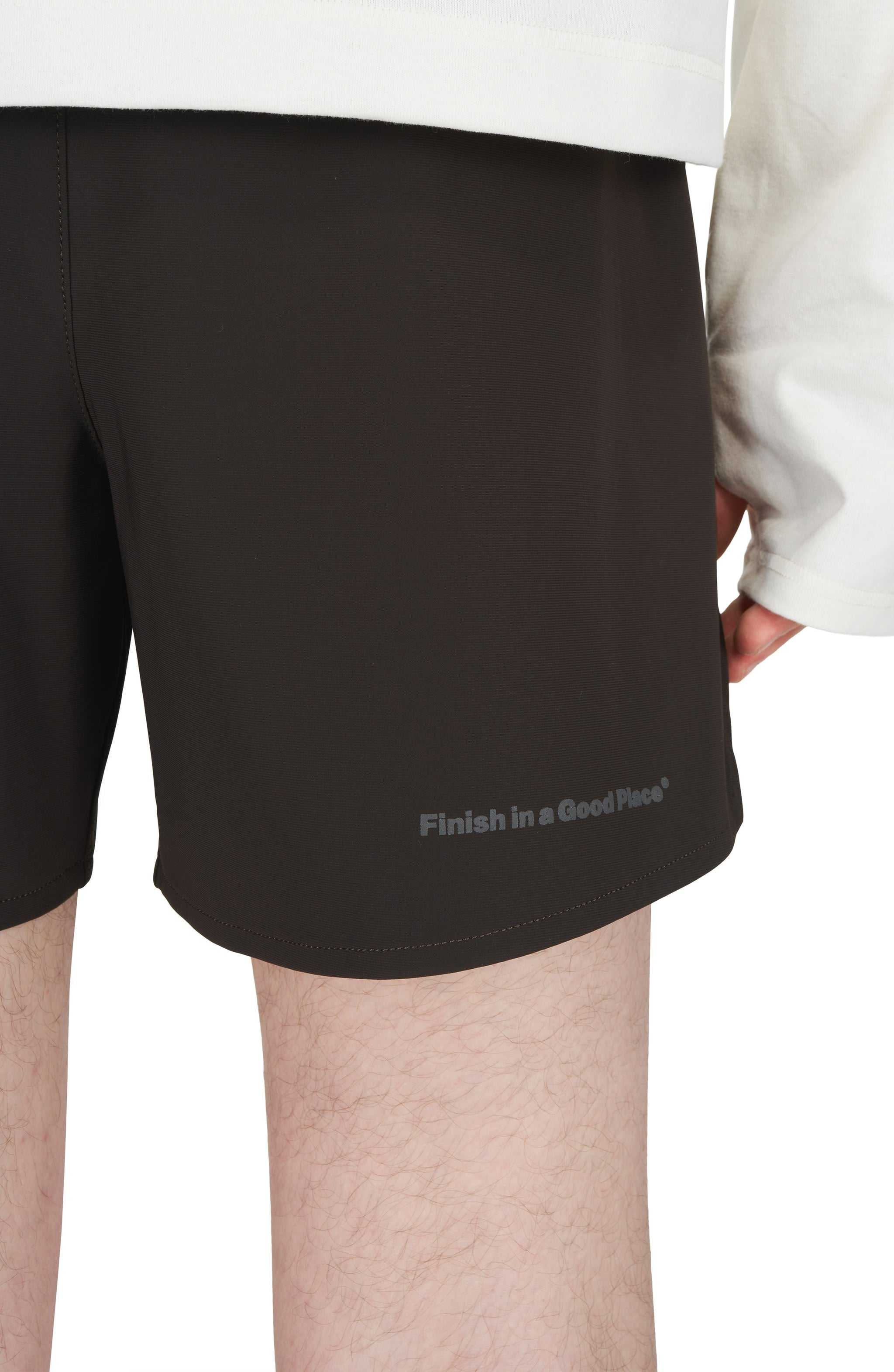 Men's Java Brown running shorts with side vents and hidden pockets.