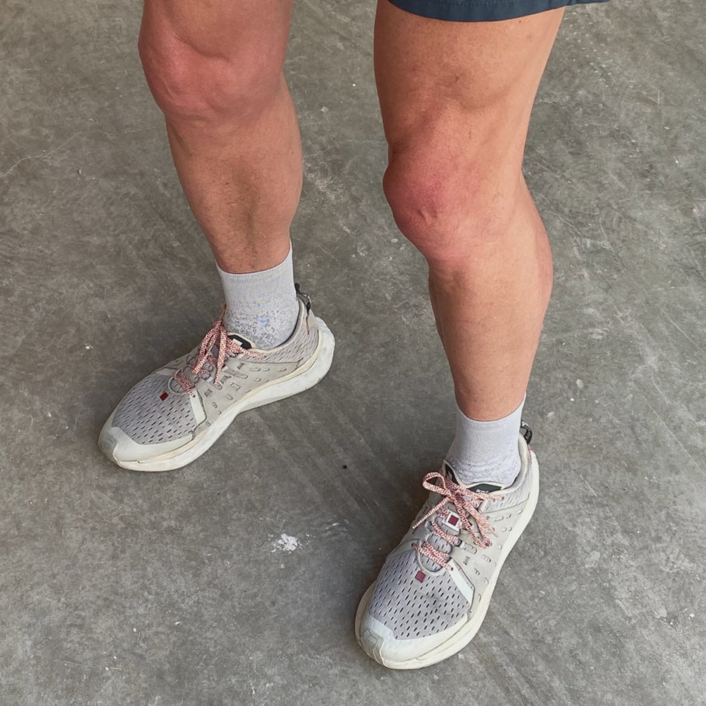 Light grey 'sundays' running shoes with breathable mesh and supportive midfoot design, ideal for comfortable long-distance runs.