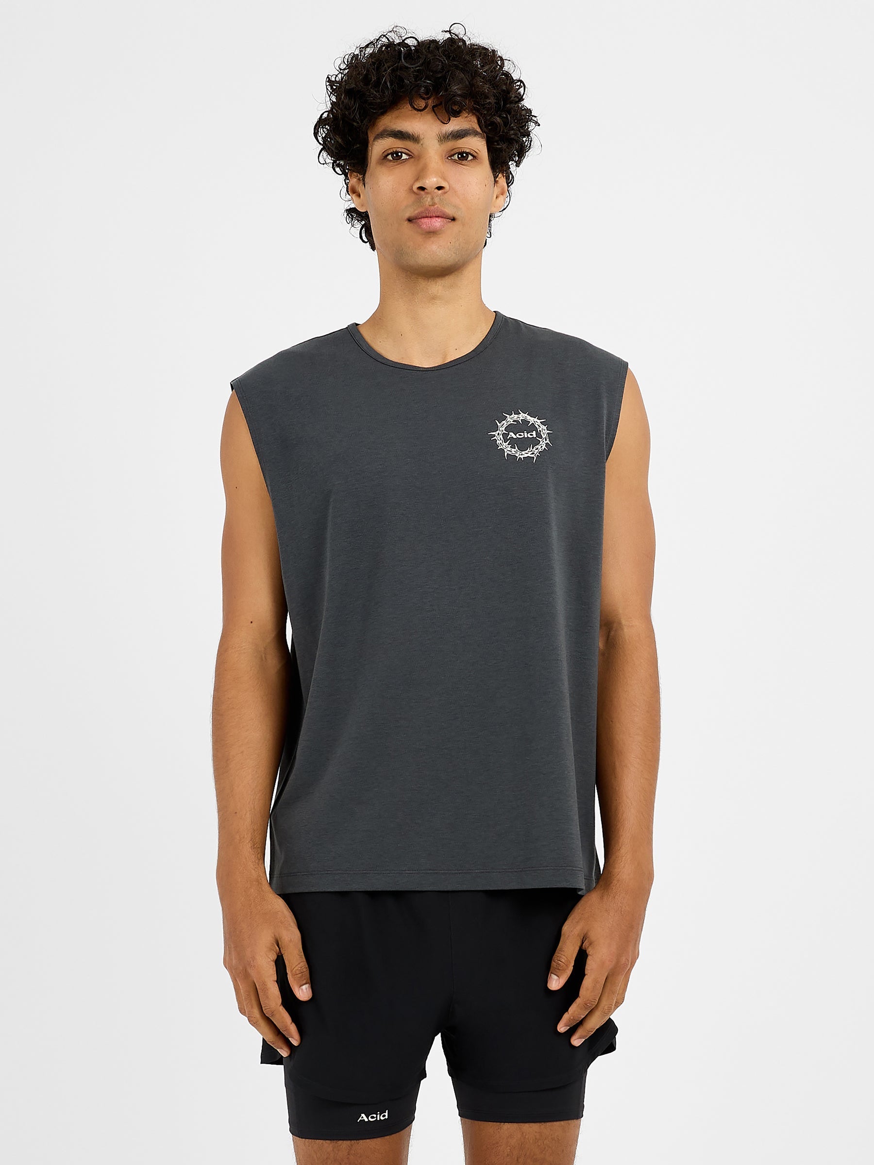 Men's The Good Fight Tank in graphite grey with sleeveless cut, crew neck, and small white logo on chest, relaxed fit