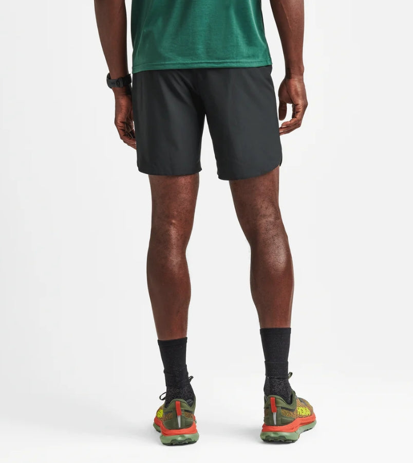 Baja Shorts 7" in dark color, featuring quick-drying polyester stretch blend, suitable for running with elastic waistband and reflective logos.