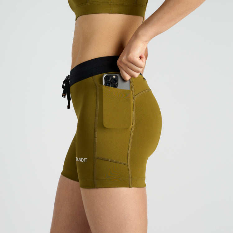 Stamina™ 5" Women's Compression Shorts with side pocket and branded waistband.