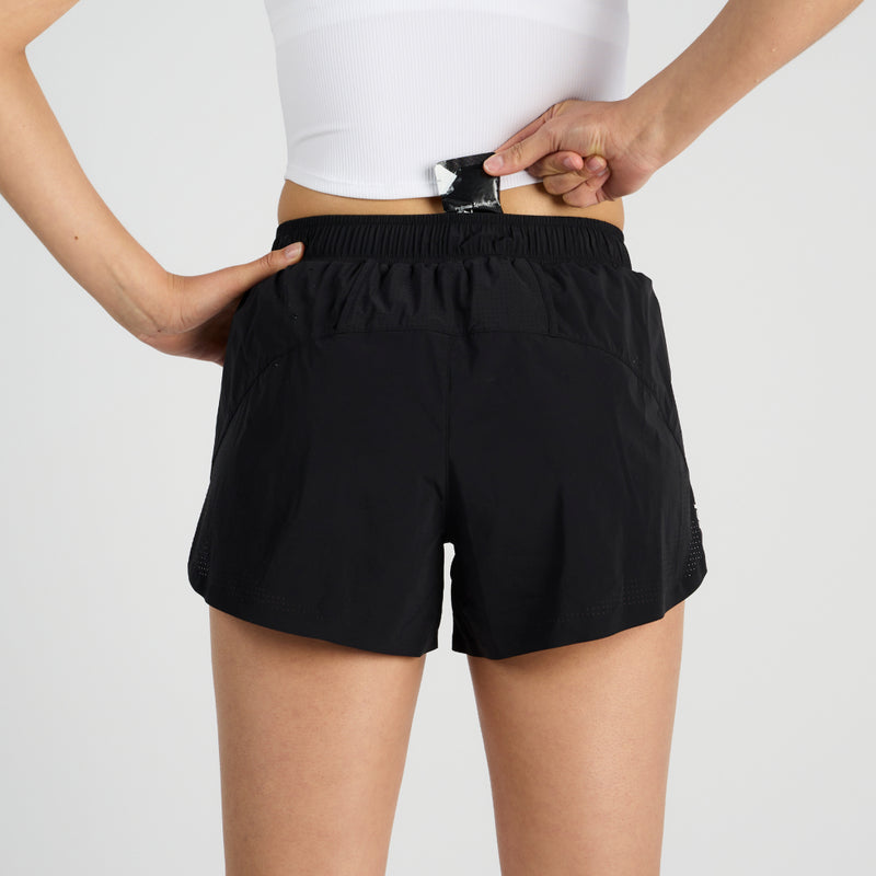 Vento™ 4" women's training shorts with built-in brief, perforated hem, and external drawcord.