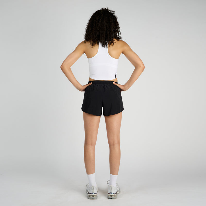 Vento™ 4" Women's Training Short with engineered perforations, shown from the back.