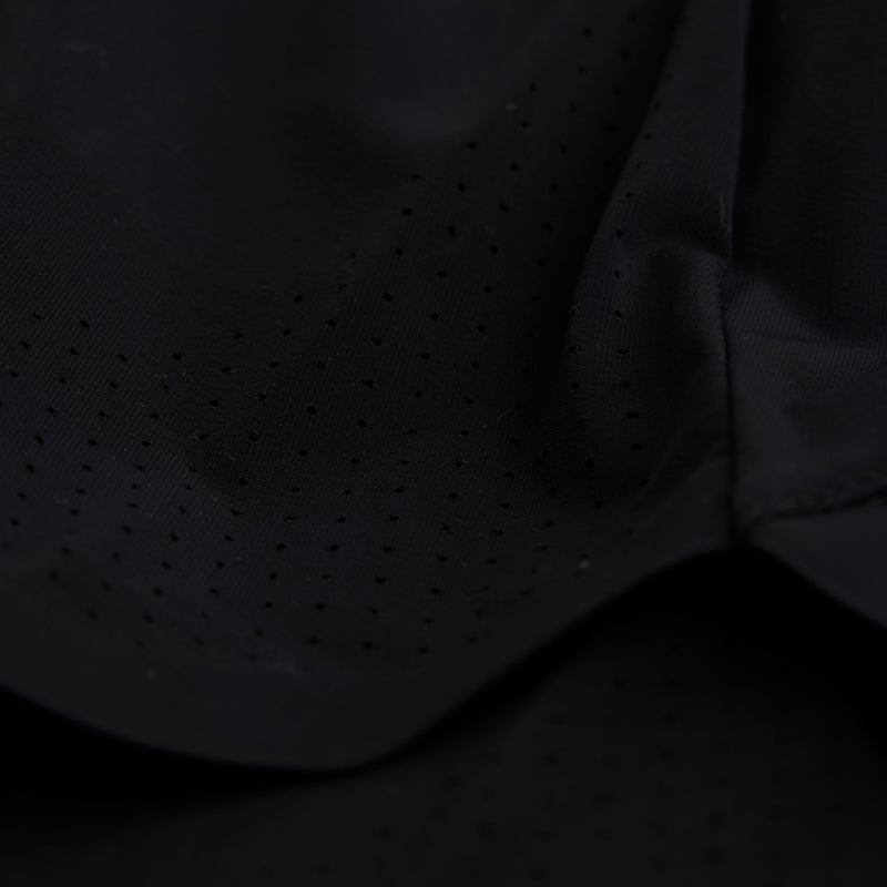 Vento 4" women's training short with perforated detail and breathable fabric.