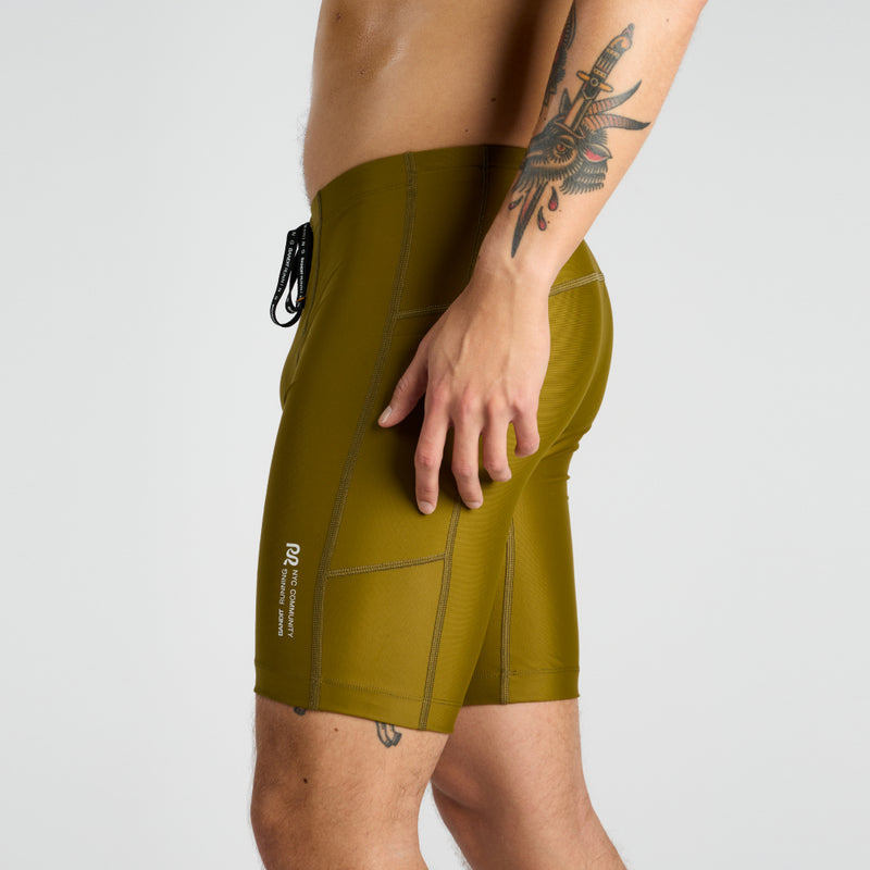 Gen 7 Pocket Half Tights with multiple pockets, reflective branding, and compression fit displayed.