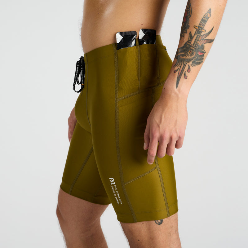 Superbeam Gen 7 Pocket Half Tights with grip tape and reflective branding.