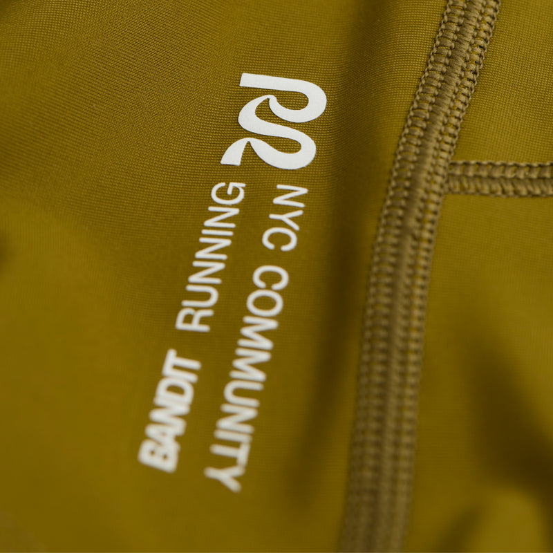 Superbeam™ Next Gen 7 Pocket Half Tights with reflective branding and detailed stitching.