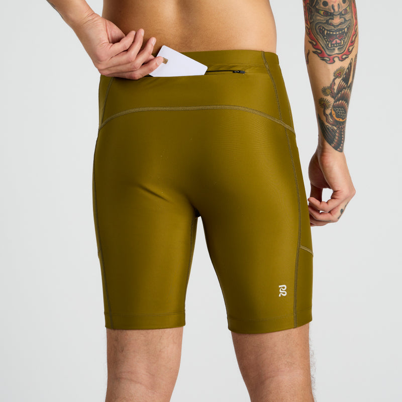 Gen 7 Pocket Half Tights with multiple pockets in olive green, showcasing back view.