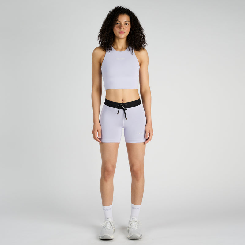 Stamina™ 5" Women's Compression Shorts with dual pockets and adjustable waistband.