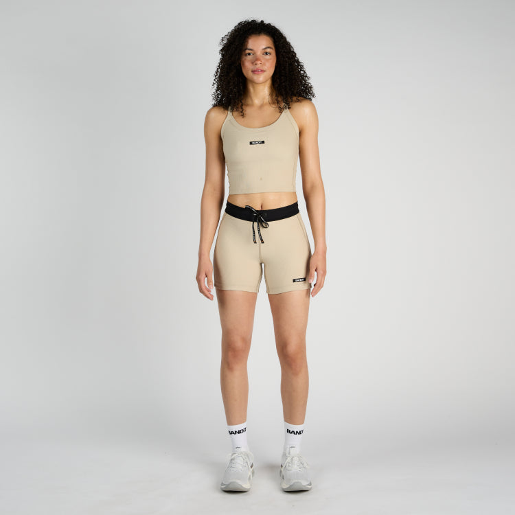 Cadence™ 5" Women's Compression Shorts with dual anti-bounce pockets and custom waistband.