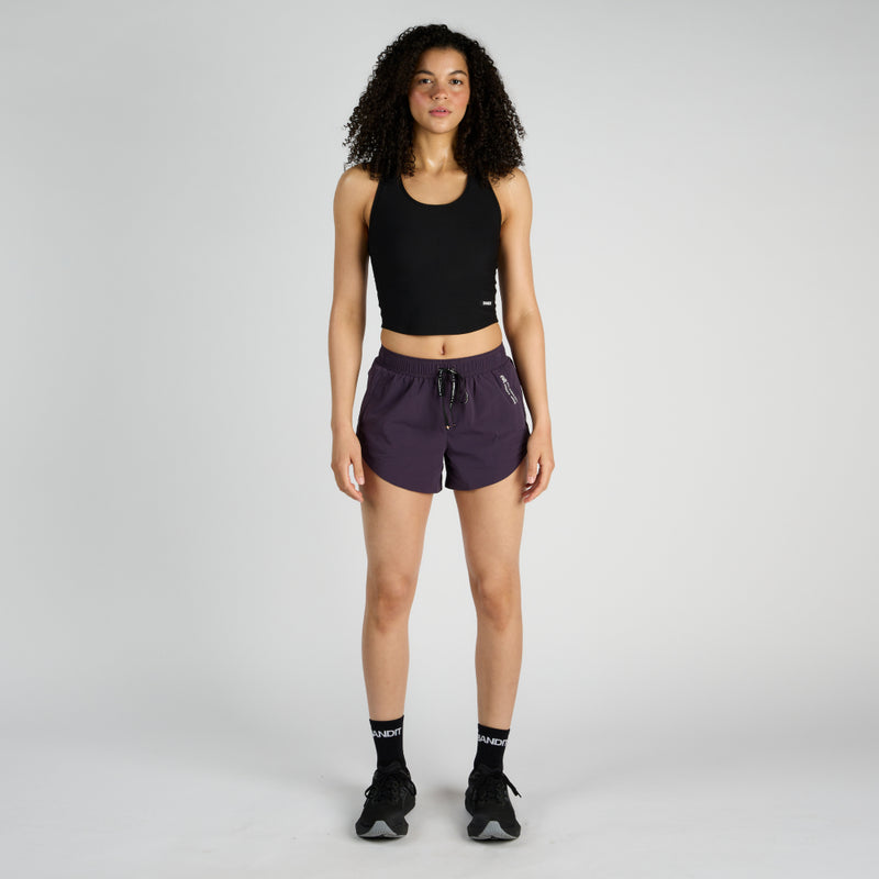 Vento™ 4" Women's training shorts with engineered perforated hem, built-in brief, and ruched waistband for running.
