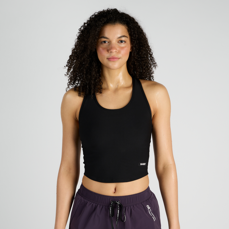 Cadence™ Performance Tank with concealed phone pocket, scoop neckline, and soft hem.