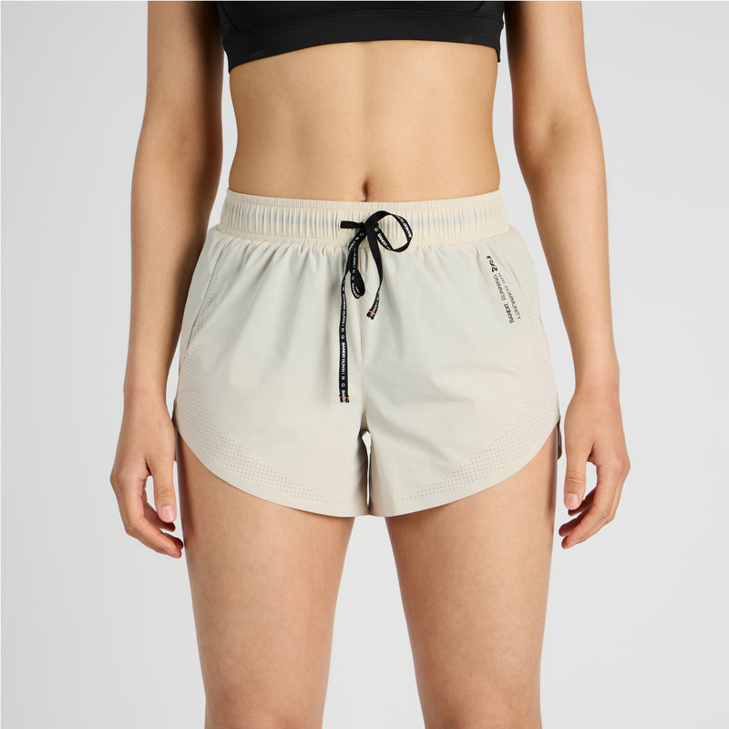 Vento™ 4" Women's Training Short with ruched waistband, perforated hem, and built-in brief.