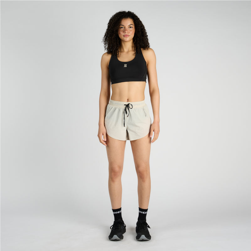 Vento™ 4" women's training shorts with engineered perforation, drawcord, and pockets.