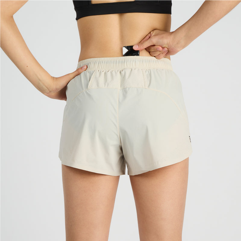 Vento™ 4" women's training short with perforated detail and functional drawcord.