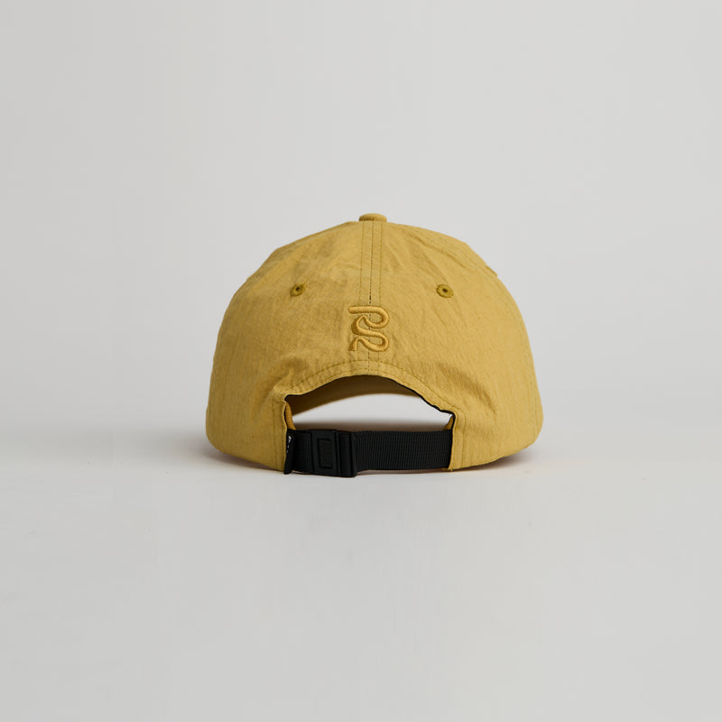 Nylon Dad Hat with adjustable webbing and embroidered logo, crafted from durable Japanese ripstop fabric.