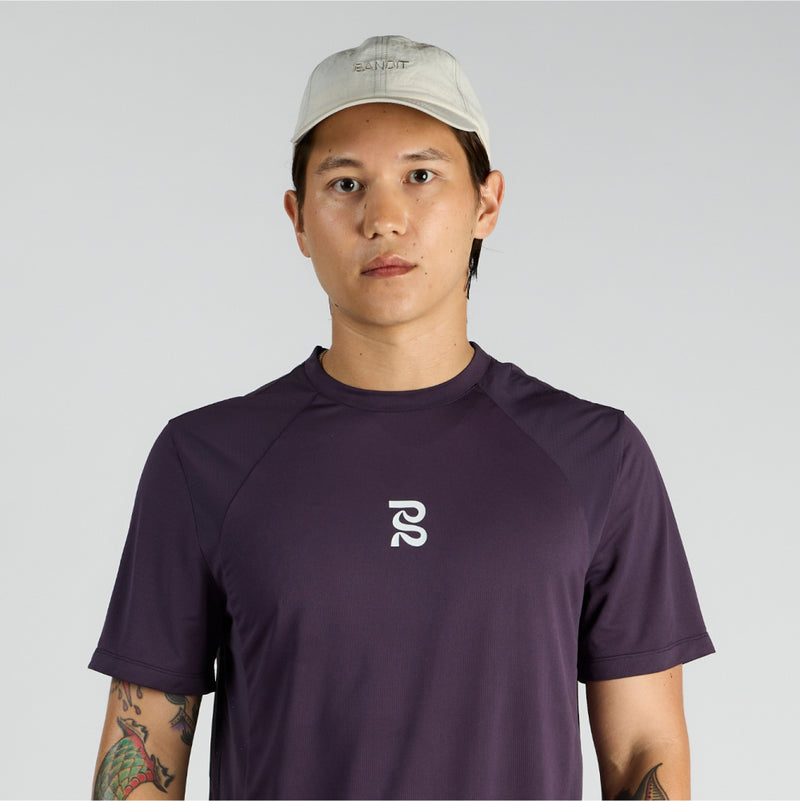 Cream Nylon Dad Hat with embroidered logo, adjustable webbing, durable Japanese ripstop fabric, water-repellent finish.