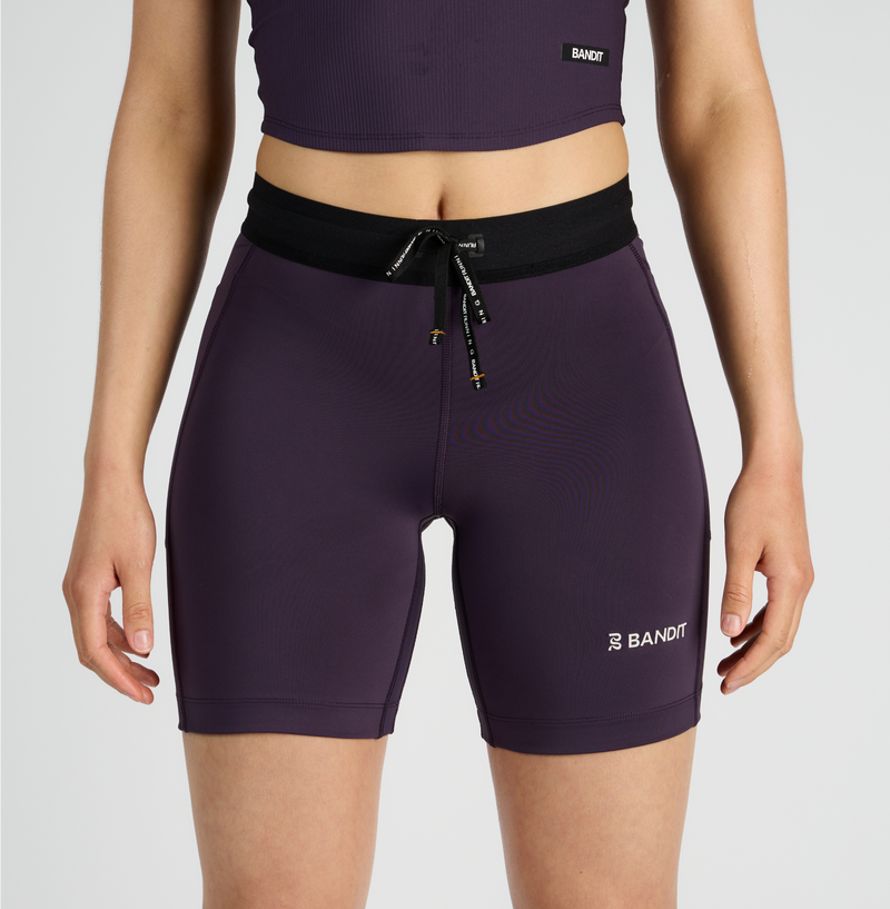 Stamina™ 7" Women's Compression Shorts - Nightshade, showcasing custom waistband and dual side pockets.