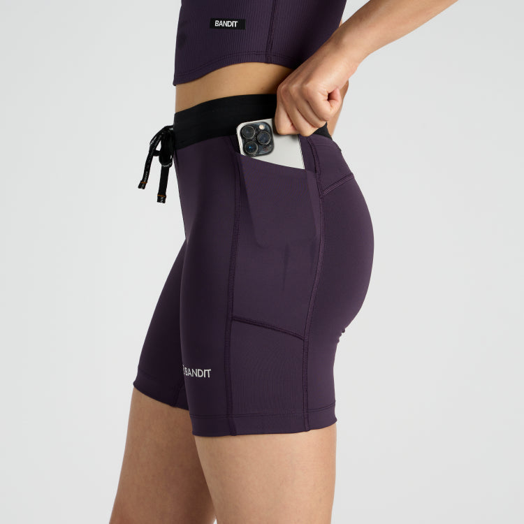 Stamina™ 7" women's compression shorts in Nightshade with side pocket for phone.