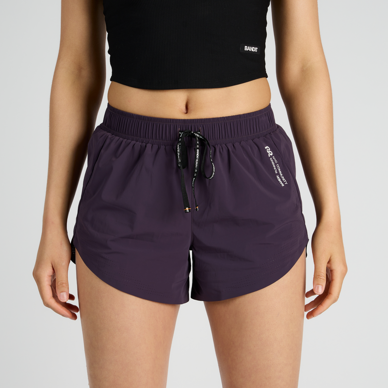 Vento™ 4" women's training short with ruched waistband and perforated hem.