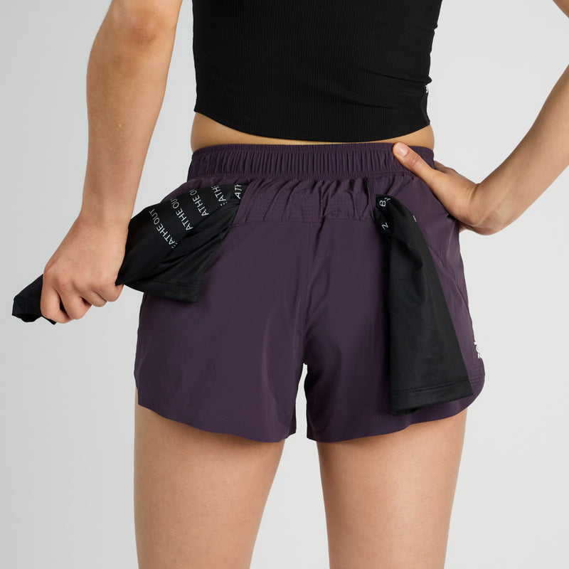 Vento™ 4" Women's Training Short with ruched waistband and t-shirt stash tunnel.